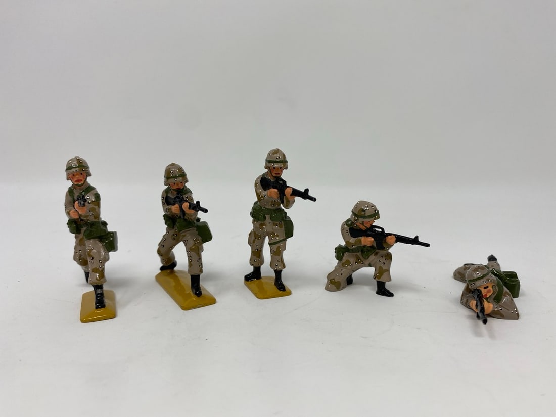 5 Toy Soldiers: A group of five toy soldiers. US Marines MPs in Operation Desert Storm
