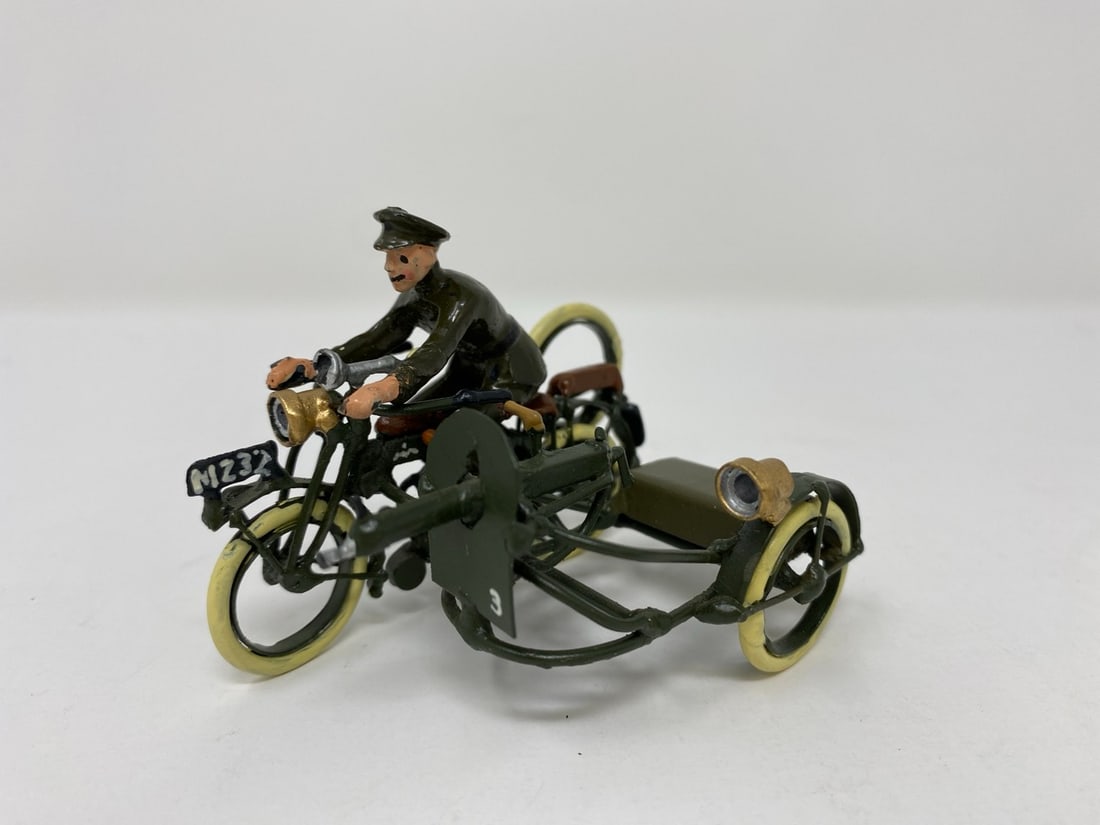 Toy soldier on motorcycle: A toy soldier. Kleimo Motorcycle