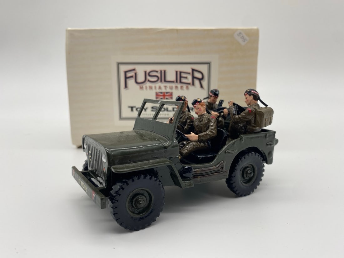 Fusilier Miniature WWII Scottish soldiers.: A group of Fusilier Miniatures WWII Scottish soldiers with vehicle.