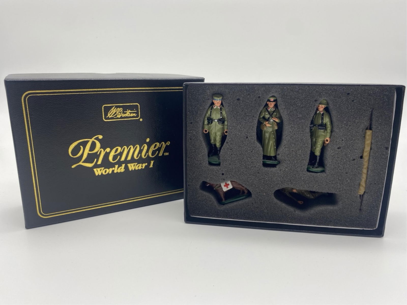 W Britain WWI Austrian soldiers.: A group of W. Britain Premier WWI soldiers with dog. "Austrian Stretcher Party."