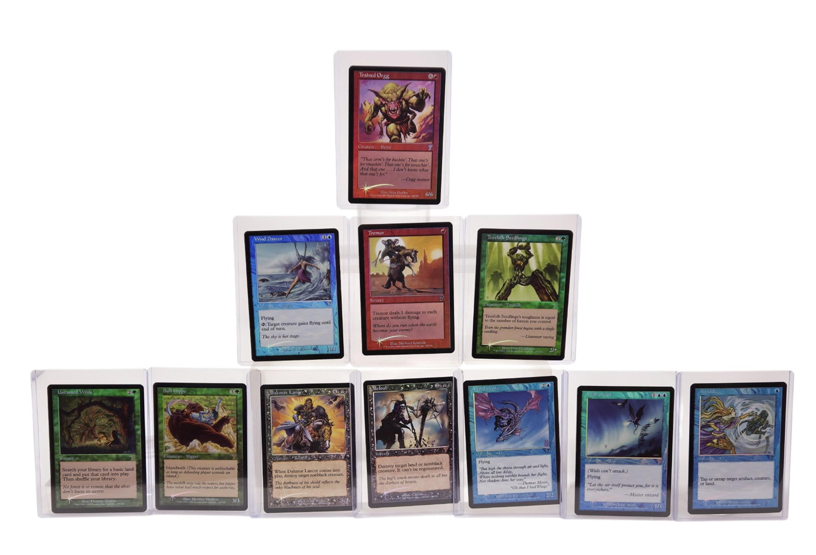 32 MTG: 7th Edition Foil cards: A group of 32 Magic: The Gathering 7th Edition Foil cards. Including Aether Flash (foil), Befoul (foil), Bull Hippo (foil), Storm Crow (foil), Dakmor Lancer (foil), Gerrard's Wisdom (foil), Gorilla Ch