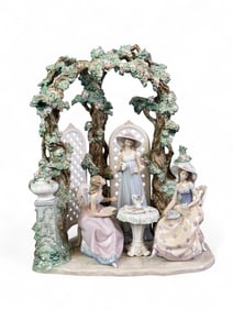 Lladro, "Tea in the Garden," figural group.