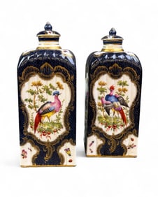 2 European lidded vases.