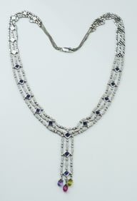 14KWG Three strand gemstone necklace.