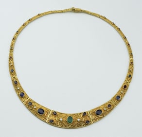 18KYG Graduated Cleopatra style necklace.