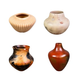 4 Southwest pottery vases.