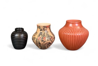 3 Southwest pottery vases.