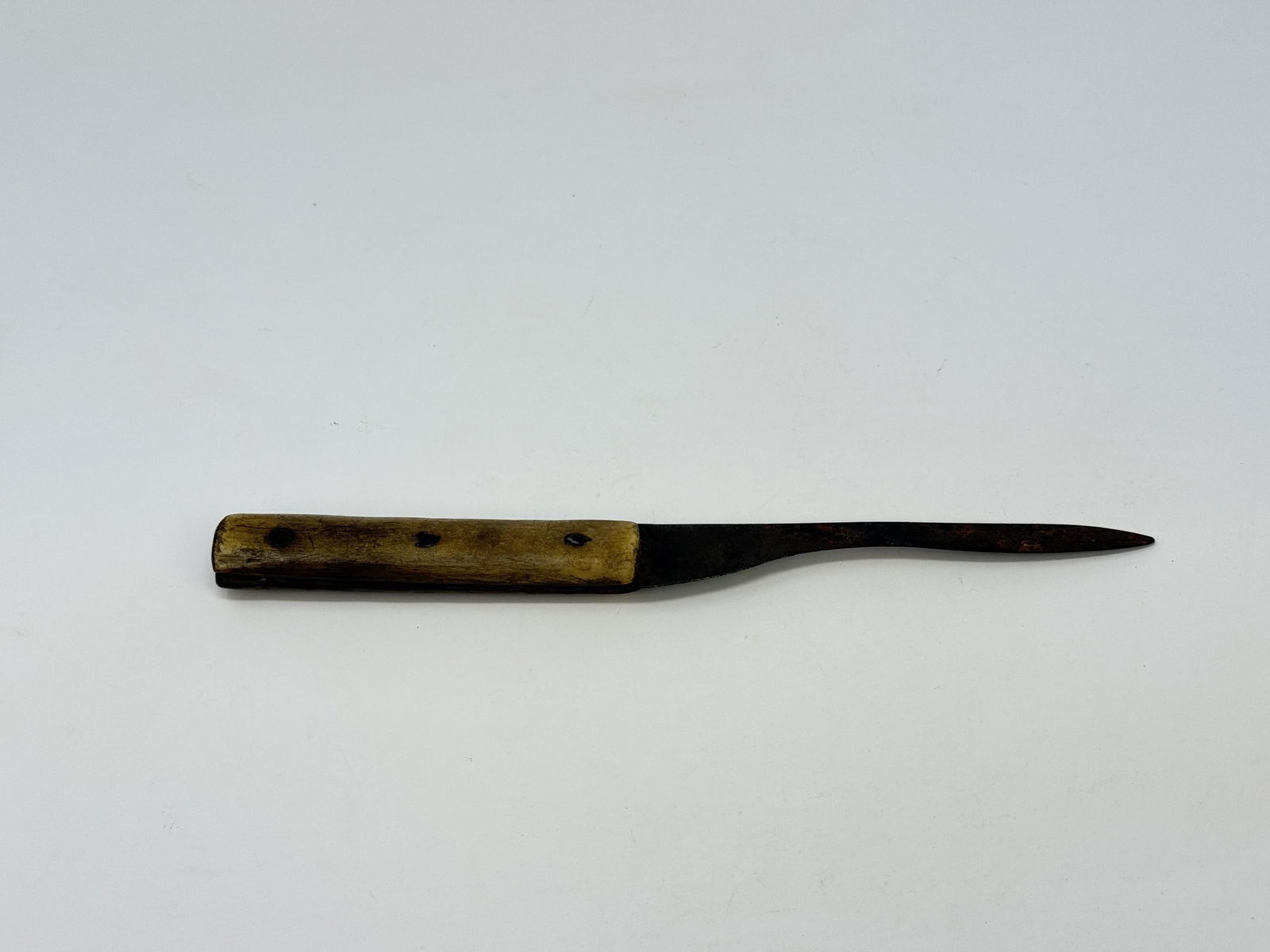 Knife with bone handle, 19th c.: A knife with bone handle. 19th century. 5/8" x 9 7/8" x 7/8". Condition: Worn blade.