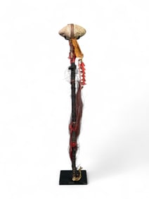 Native American war club or ceremonial staff.