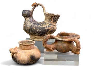 3 Pre-Columbian pottery vessels.
