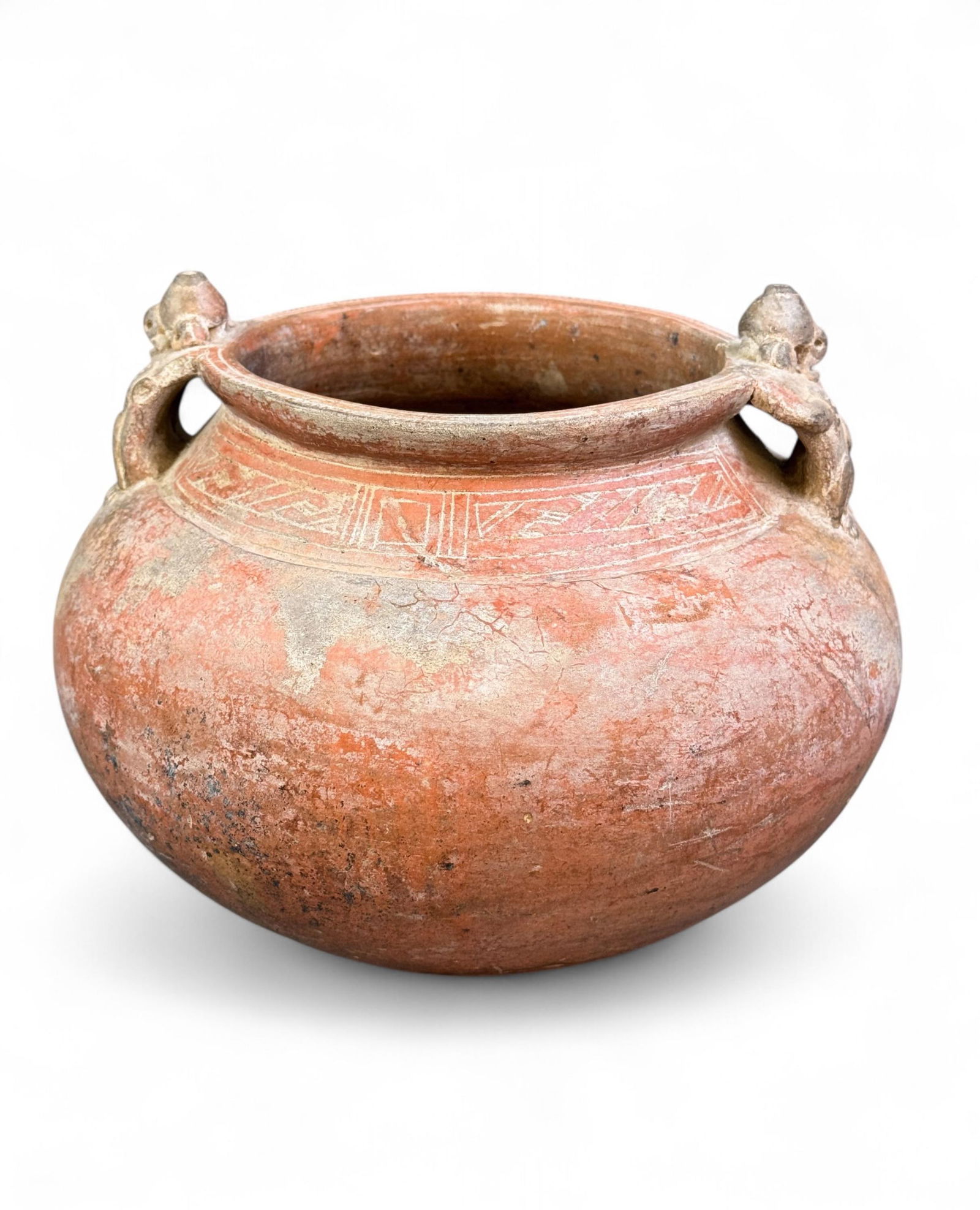 Costa Rican vessel.: A Costa Rican redware pottery vessel with figural and geometric designs. 7" x 9". Condition: Abrasions, surface dirt. Provenance: From the collection of Bruce and Leslie Forrest.