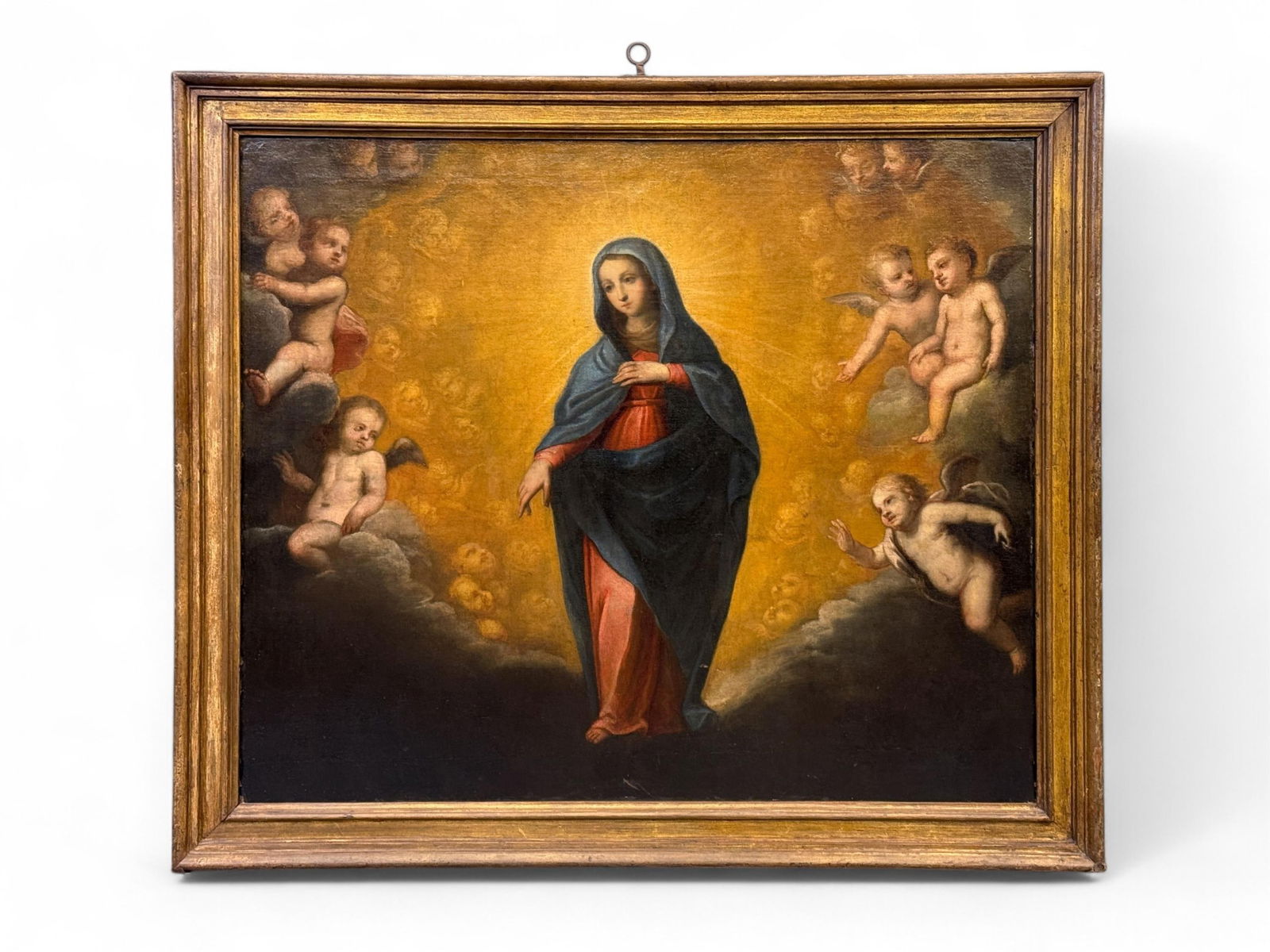 School of Murillo, Virgin and Angels, O/C.: School of Bartolome Esteban Murillo (Spanish, 1617-1682). Virgin Mary surrounded by angels. Oil on canvas. 17th century. Sight: 39 1/2" x 47". Frame: 46 1/2" x 54 1/2". Condition: Relined, craquelure,