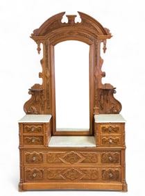 Eastlake style burl wood vanity.