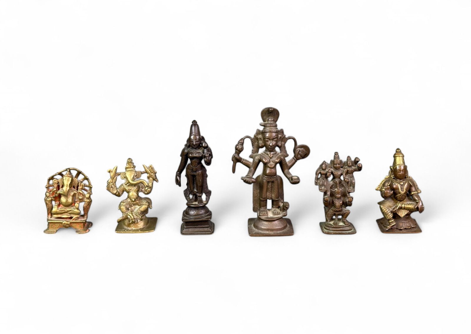 Six bronze and brass deity figures. (1 of 7)