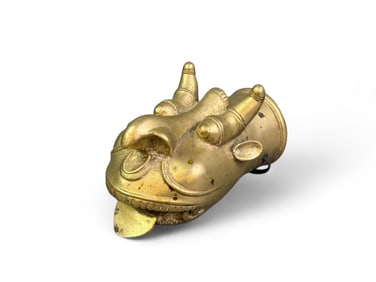 Brass ritual mask of a deity.