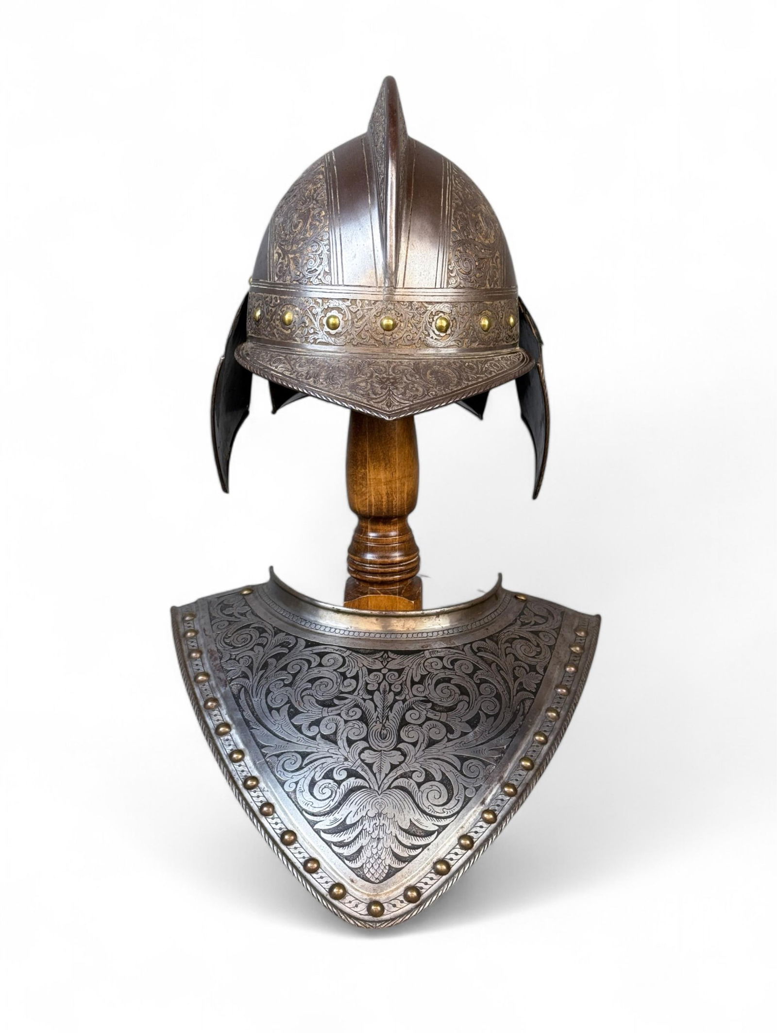 Victorian etched parade burgonet and gorget.: A Victorian copy of a 16th century etched parade burgonet and gorget. Smallest: 11"x 13" x 8". Largest: 13" x 13 1/2".