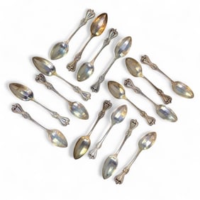 16 Towle "Old Colonial" sterling teaspoons.