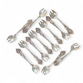 12 Wallace "Orchid" sterling forks.