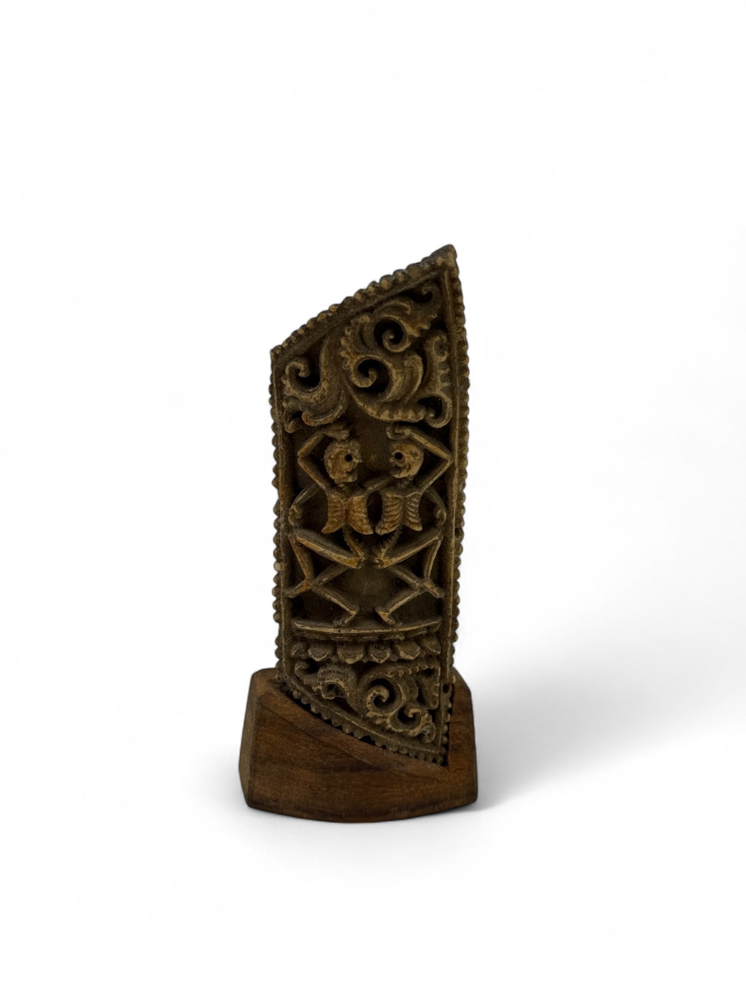 Small bone plaque, Tibet, 18th c.: A small bone plaque with two skeletons. 18th century. Tibet. With mount: 3 1/2" x 1 1/2" x 13/16".