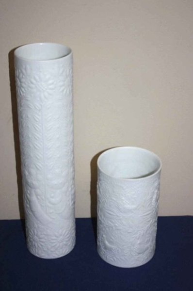 Lot of 2 Rosenthal studio Line vases.: In white porcelain. 13" vase with children & sunflowers, 6.5" vase with Birds & foliage.