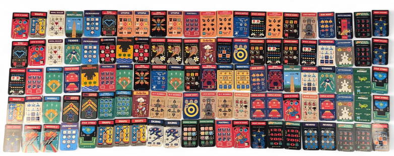 107 Intellivision controller overlays: A group of 107 Intellivision controller overlays. Primarily unused and in good condition.