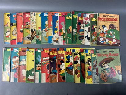30 Dell Walt Disney comics: A group of thirty Silver Age Dell Comic Walt Disney comics. ++ 13 issues of "Mickey Mouse" comics. Including #50 (1956). ++ 16 "Walt Disney Comics." ++ "Uncle Scrooge: Back to the Klondike" #456