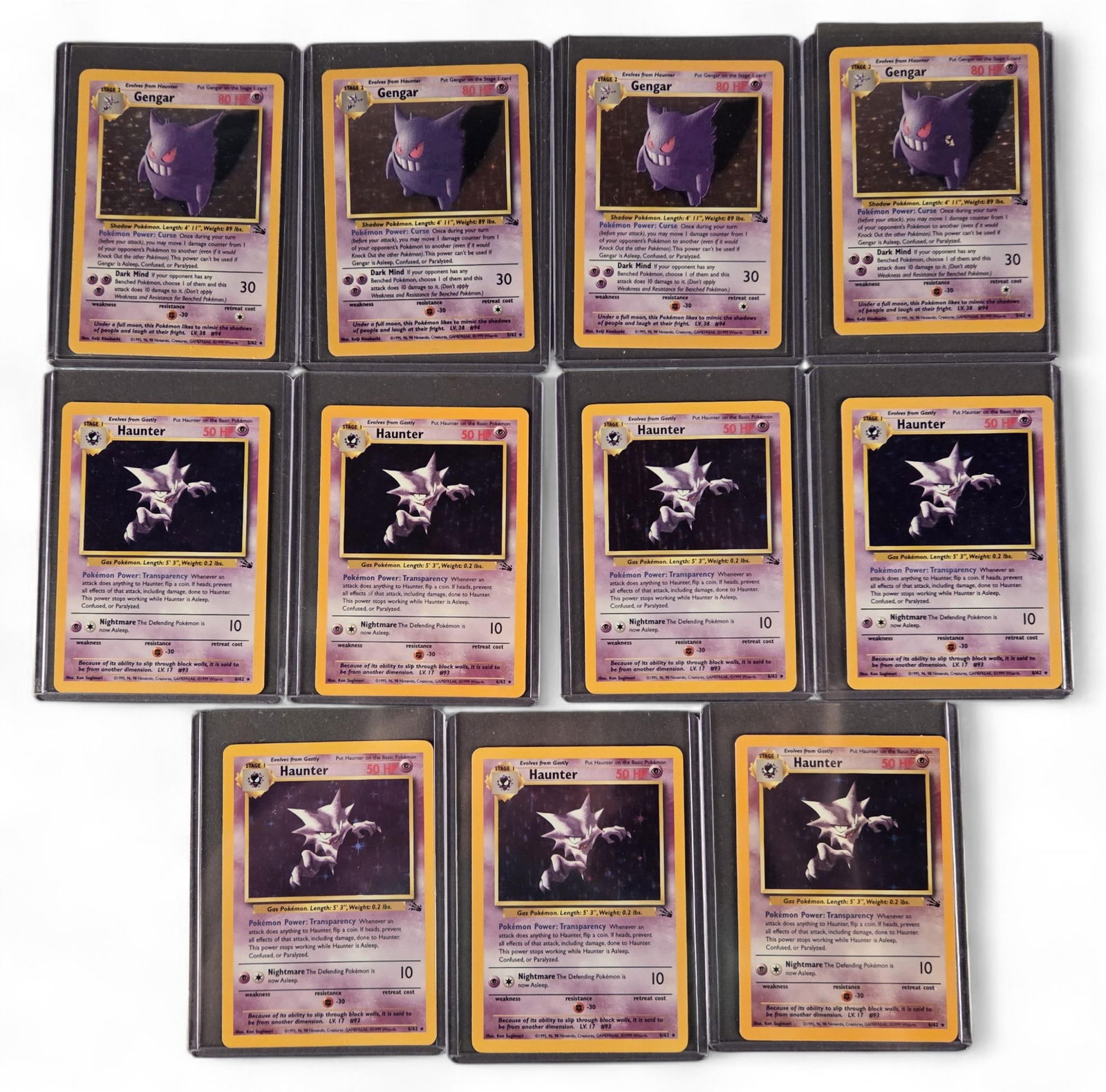 11 PTCG Fossil [Ultd] holo Gengar & Haunter cards: A group of eleven Pokemon TCG Fossil [Unlimited] holofoil cards. Four Gengar #5 and seven Haunter #6.