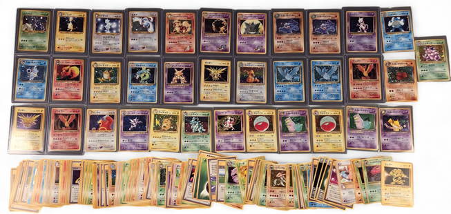 128 Early Japanese PTCG cards: A group of 128 early Japanese Pokemon TCG cards. ++ seventeen Expansion Pack cards, including Alakazam, Gyarados, Mewtwo, Nidoking, Polywrath, Pokmon Trader, Raichu, and Zapdos. ++ twenty Mystery of t