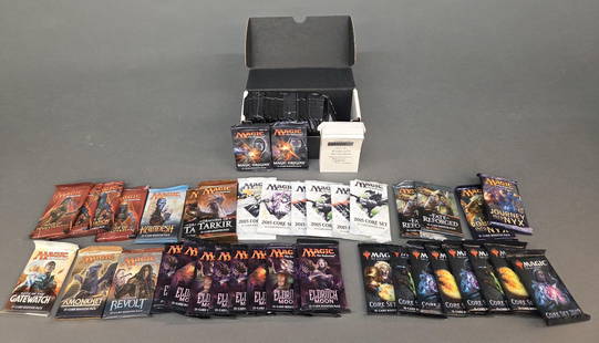 63 MTG Booster Packs: A group of sixty three Magic: The Gathering Booster Packs. Including two Journey into Nyx boosters, two Fate Reforged boosters, two Dragons of Tarkir boosters, sixteen 2015 Core Set boosters, Oath of