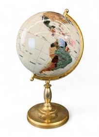 Globe with semi-precious stone inlay.