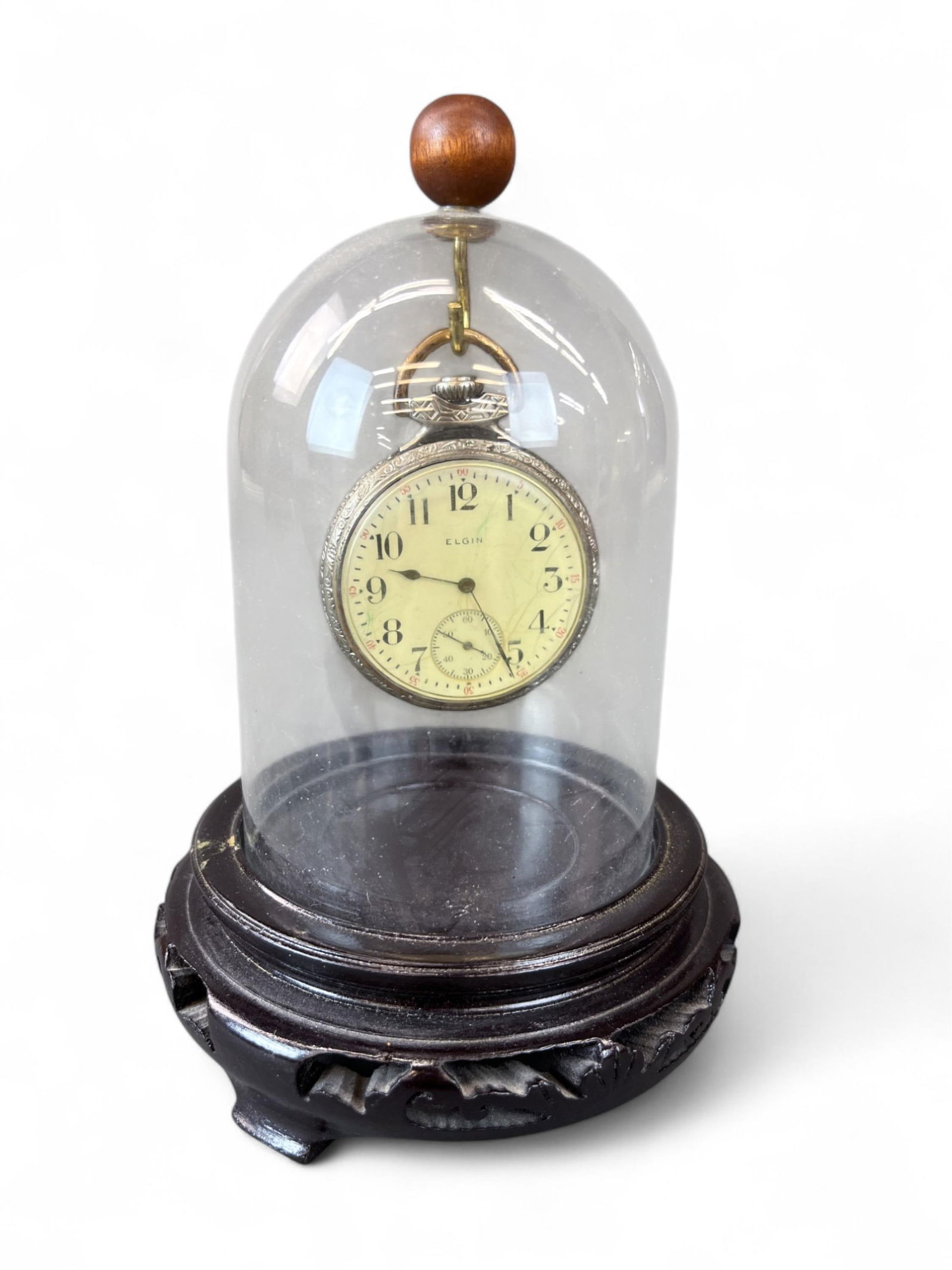 Gen. Brown Elgin pocket watch.: A 1917 Elgin open-face pocket watch, belonging to Lt. Gen. James R. Brown, USAF. Model 7, size 16s, 7 jewels, with Arabic numeral dial, subsidiary seconds dial, and engraved case, housed in a glass do