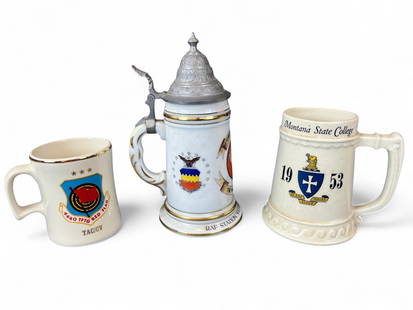 3 Gen. Brown ceramic tankards and mugs.: A group of three mugs and steins from Lt. Gen. James R. Brown, USAF. ++ A TAC/USAF 4440 TTFG ?Red Flag? ceramic mug. ++ A German stein with pewter lid marked ?RAF Station,? ++ A Montana State College