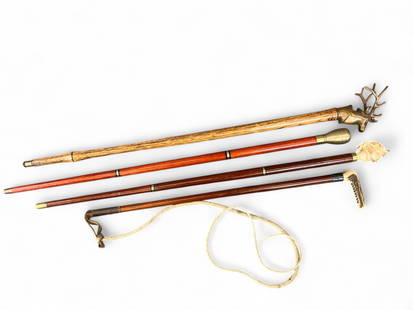 Gen. Brown canes and whip.: A group four canes belonging to Lt. Gen. James R. Brown, USAF, including three canes and one riding crop/whip. Canes feature various decorative handles including brass stag, brass knob, carved