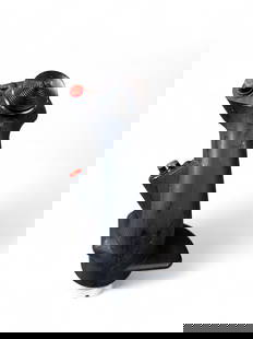 MC-2 flight control grip. Lt. Gen. James R. Brown: An original MC-2 aircraft flight control grip, formerly the property of Lt. Gen. James R. Brown, USAF. Constructed with black grip, multiple control buttons, and connection fitting with intact pins.