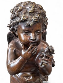 2 Cupid sculptures.