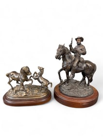 2 Equestrian sculptures.