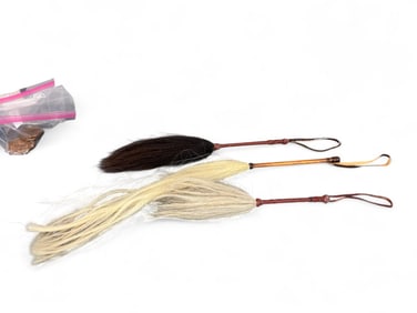 3 Fly whisks.