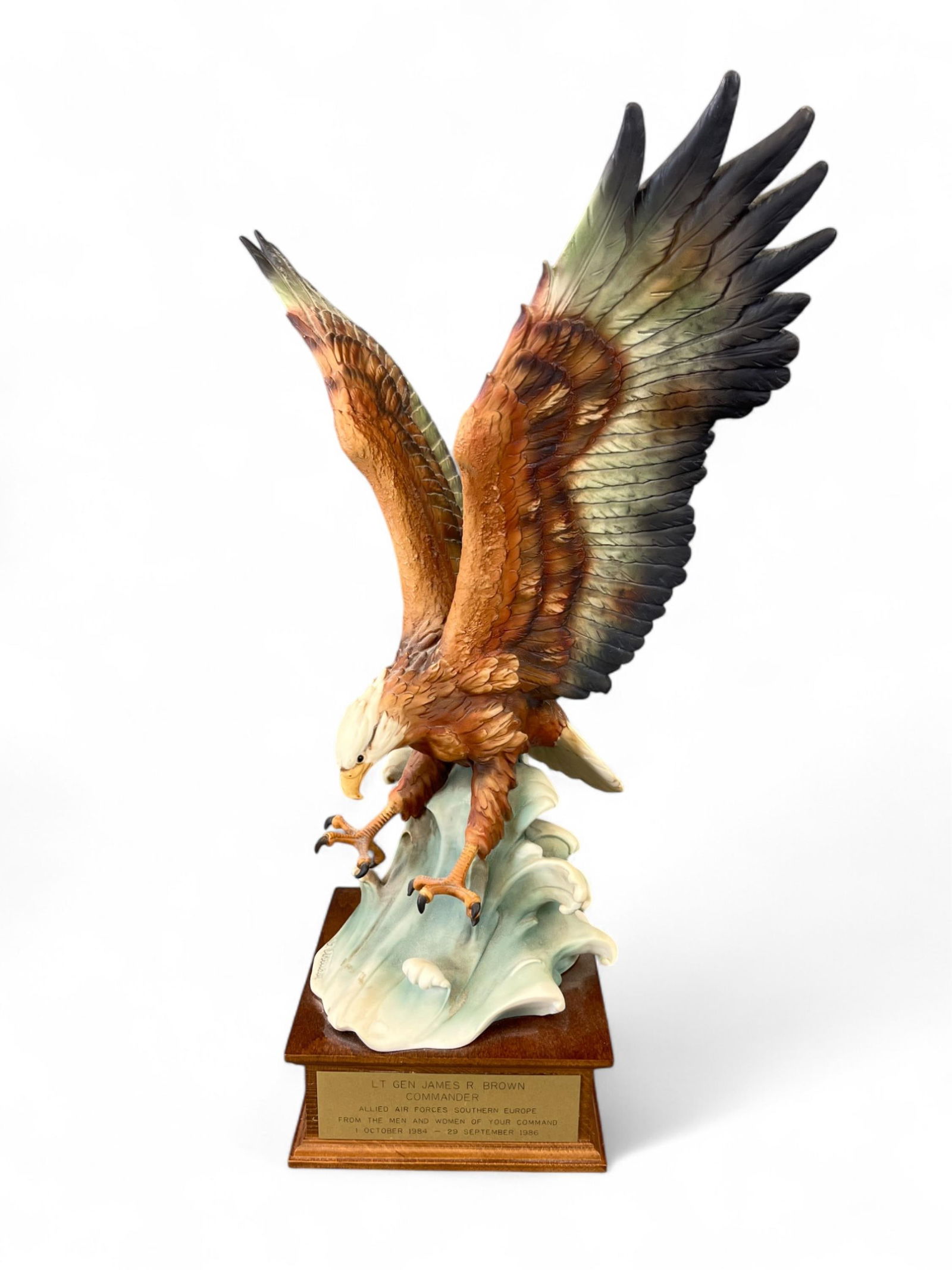 Gen. Brown presented G. Armani porcelain eagle.: A Giuseppe Armani porcelain eagle. Presented to Lt. Gen. James R. Brown, USAF. With presentation plaque that reads "Lt. Gen. James R. Brown Commander Allied and Air forces Southern Europe from the men