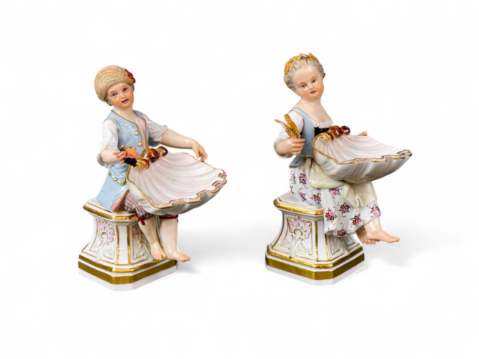 2 Meissen seasons spice bowls.: A group of two Meissen seasons spice bowls, Summer and Fall. Circa 1815 to 1924. Meissen mark on underside. Smallest: 5" x 3" x 3". Largest: 5" x 3 1/2" x 3". Provenance: From the Estate of U.S.A.F. L