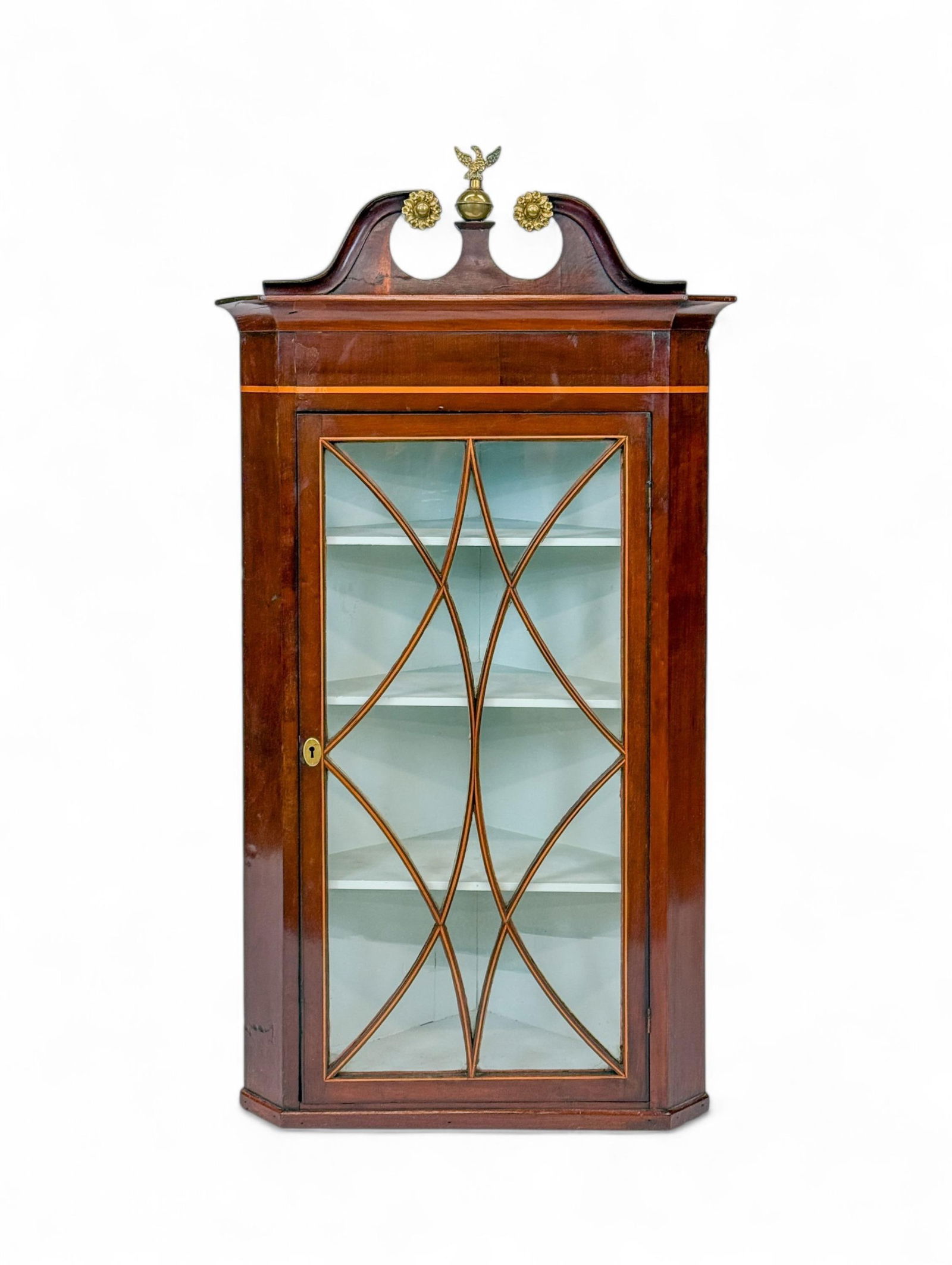Federal mahogany corner cabinet.: A Federal mahogany corner cabinet. 50" x 26 1/2" x 16". Provenance: From the Estate of U.S.A.F. Lt. General James R. Brown (1930-2015).