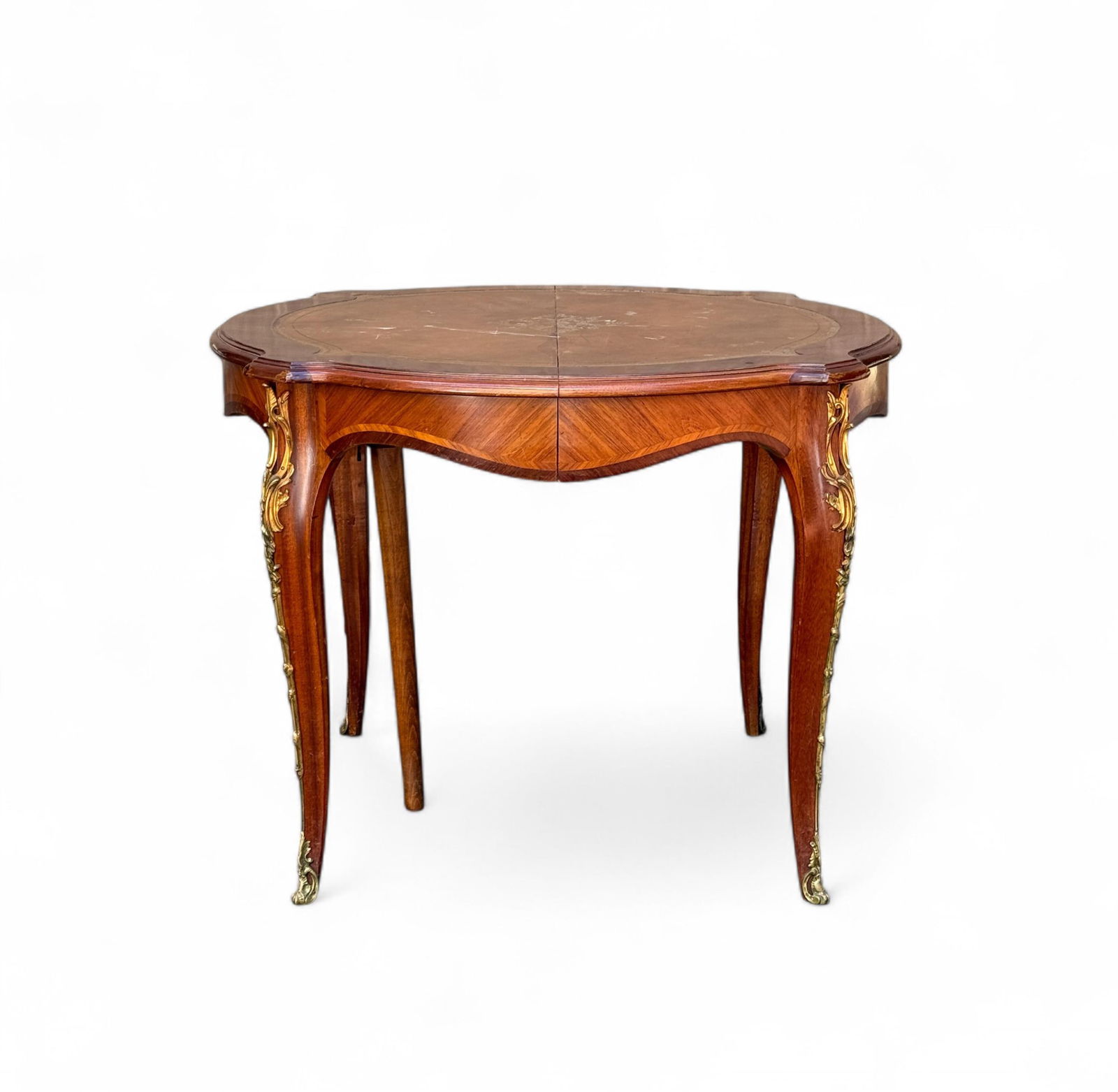 Louis XV style walnut ormolu table.: A Louis XV style walnut ormolu table. 20th century. 29 1/2" x 38".