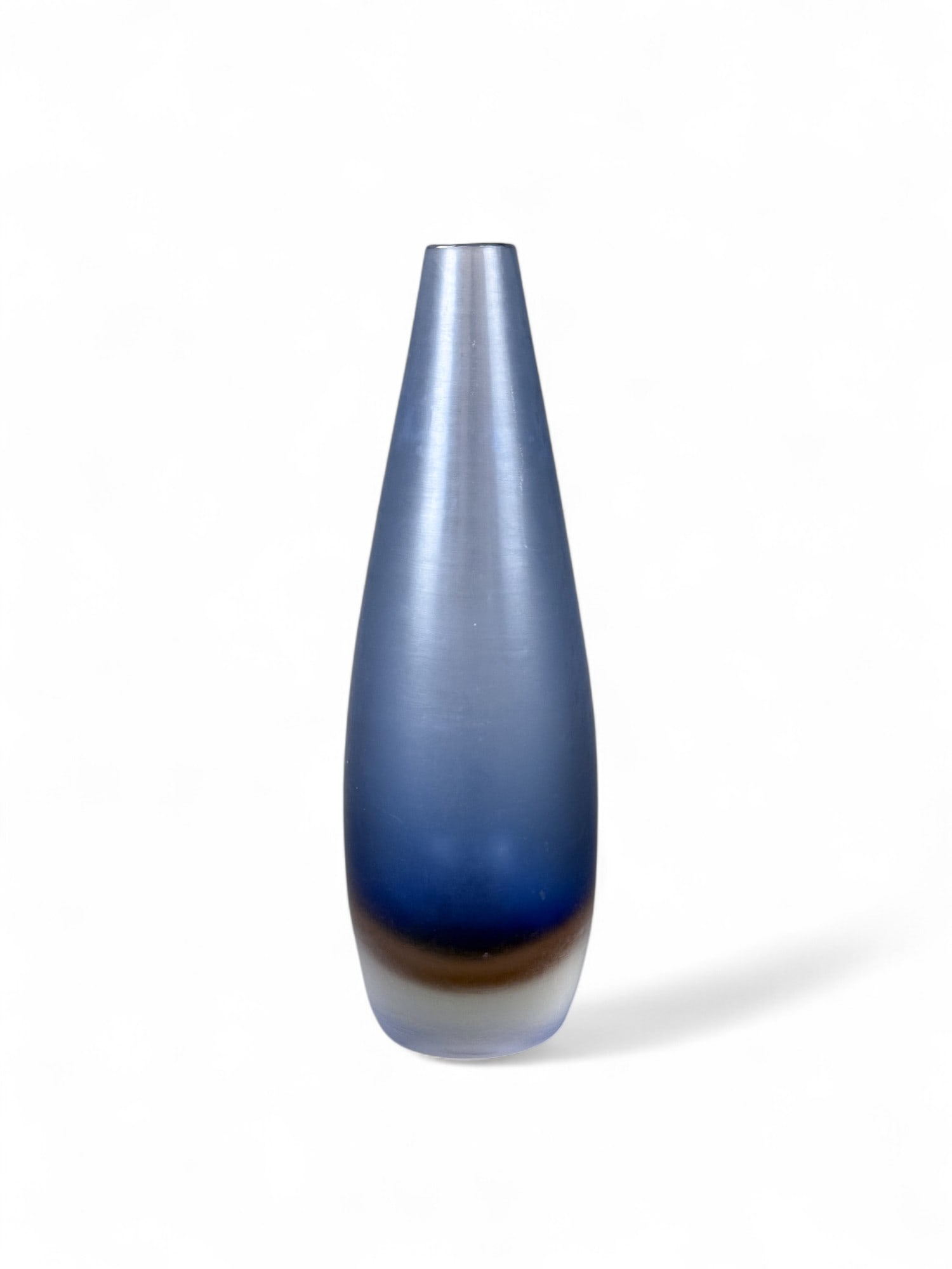 Paolo Venini, Inciso vase, c. 1956.: Venini, Paolo (Italian, 1895-1959). An Inciso blue vase. Acid etched signature on bottom "Venini Murano Italia." Circa 1956. 13" x 4 1/2". Condition: Abrasions, sticker covering etched marks on bottom