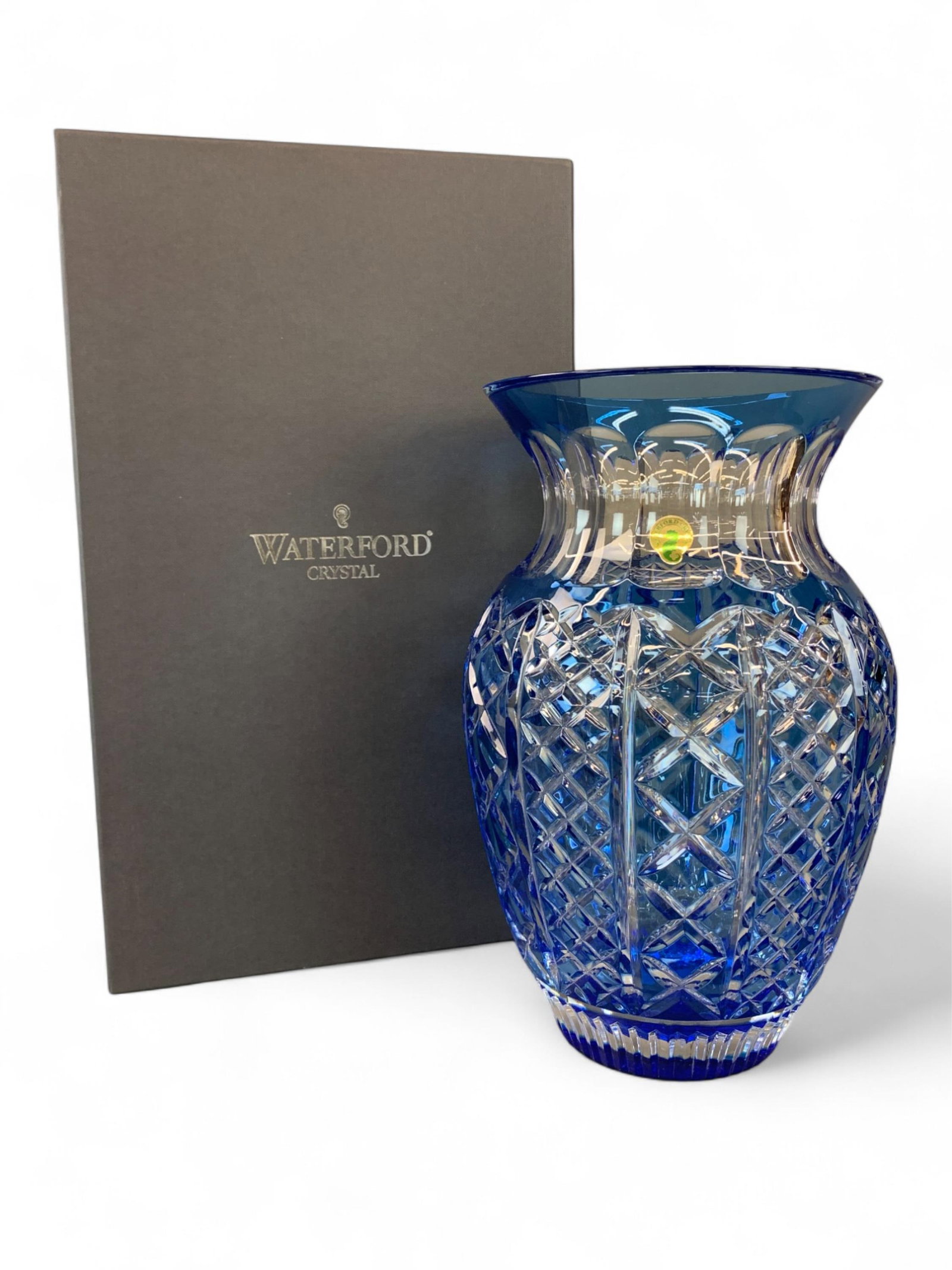 Waterford bouquet vase.: A Waterford Fleurology Molly light blue bouquet vase. Etched signature on base. In original box. 12" x 7 1/2".