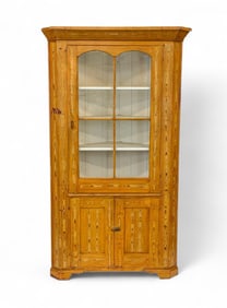 American Primitive pine corner cabinet.