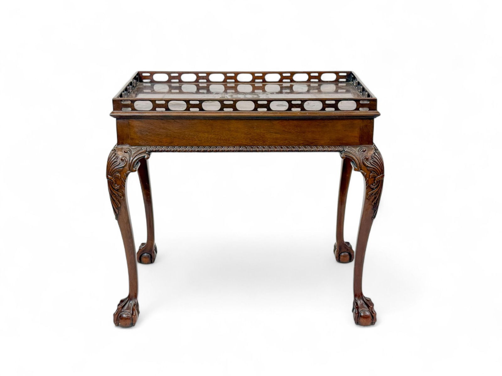Council Georgian style H1093 tea table.: A Council Georgian style H1093 mahogany tea table. 20th century. Full fretwork top raised on claw and ball feet. 28" x 31" x 20". Condition: Damaged top.