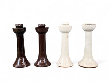 2 Pairs of Jugtown candlesticks.