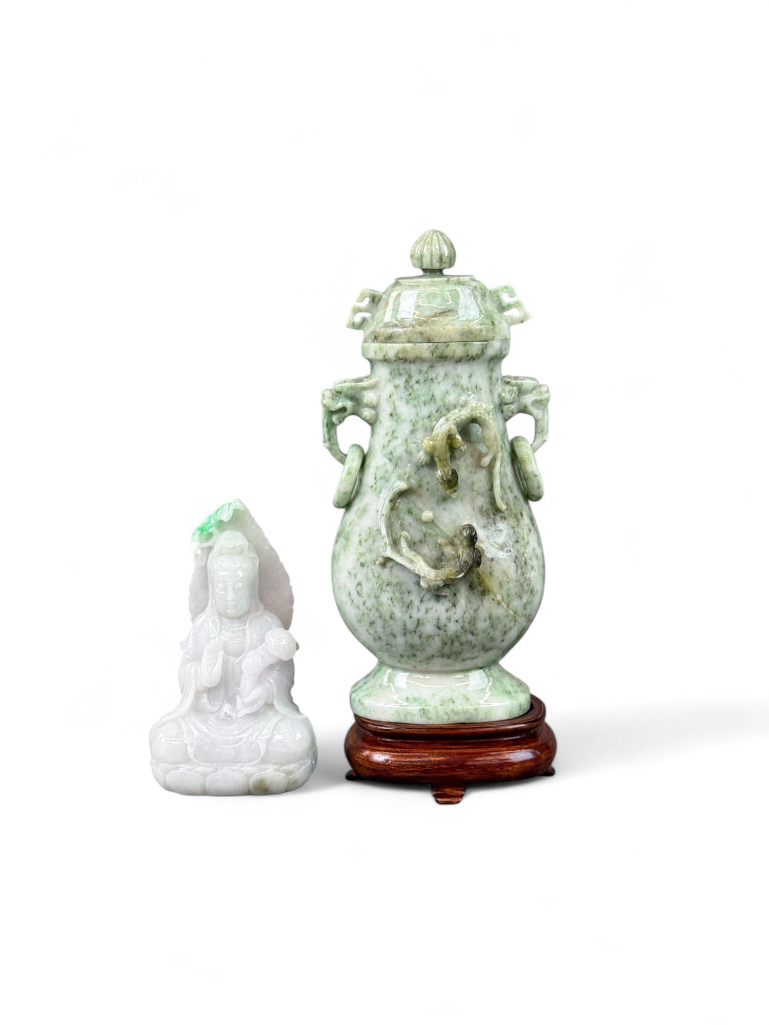2 Carved jade pieces.: A group of two carved jade pieces. Smallest: 4 1/2" x 2 1/8" x 1 3/8". Largest: 6 1/4" x 2 7/8" x 2".