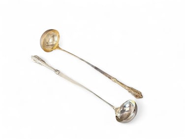 Wallace "Grande Baroque" hollow sterling ladles.