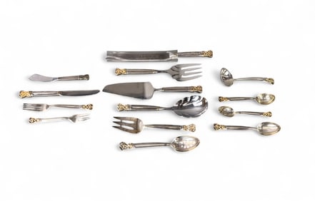 Towle "Celtic Weave Gold" sterling flatware set.