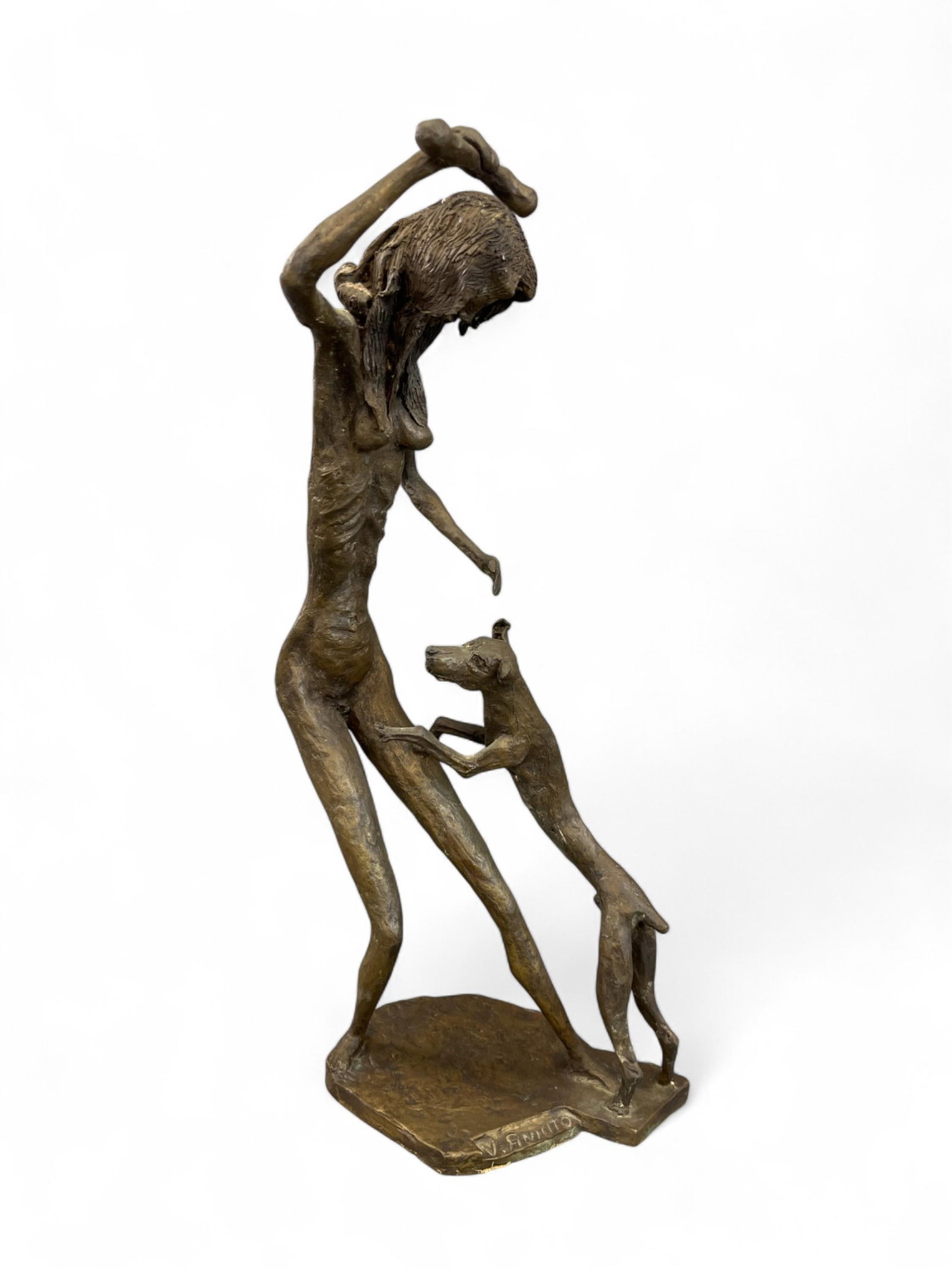 Aniato, Woman with dog, Bronze.: A bronze sculpture of a female figure with a dog. Signed "V. Aniato" on base. 19 1/4" x 8 1/2". Condition: Abrasions, residue on face. Provenance: From the collection of Aron Glasman.